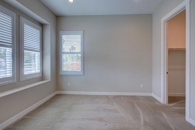 2791 E Tuolumne Rd, Turlock, CA 95382 - unfurnished bedroom featuring carpet floors, a spacious closet, baseboards, recessed lighting, and a closet