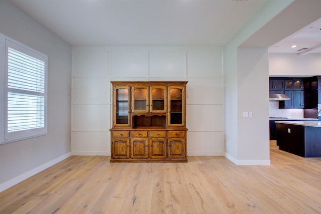 2791 E Tuolumne Rd, Turlock, CA 95382 - unfurnished living room featuring light wood-style floors, baseboards, and recessed lighting