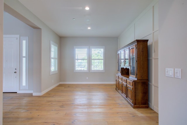 2791 E Tuolumne Rd, Turlock, CA 95382 - unfurnished living room with light wood finished floors, recessed lighting, and baseboards