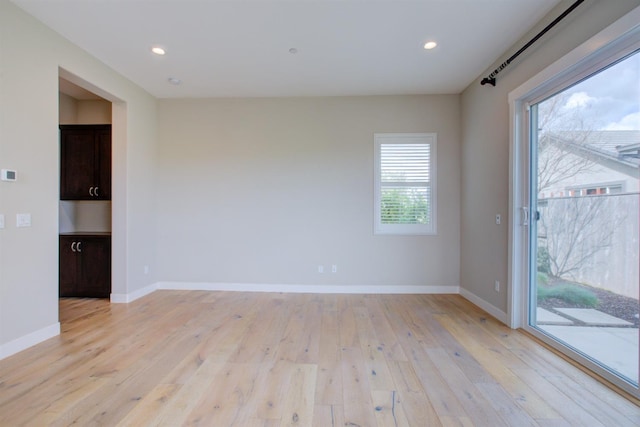 2791 E Tuolumne Rd, Turlock, CA 95382 - empty room with light wood-style floors, baseboards, and recessed lighting