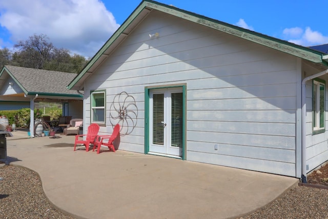 back of property featuring a patio area