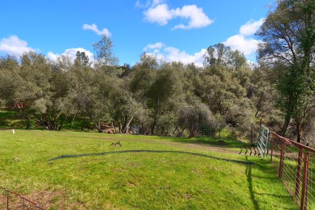 view of yard with fence