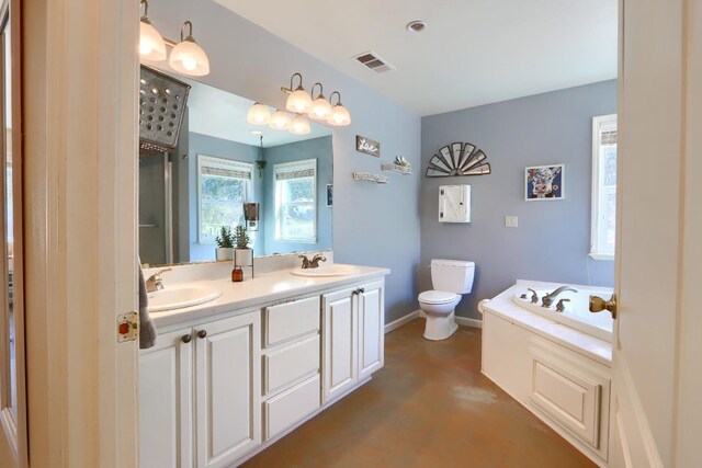 bathroom featuring double vanity, a sink, a bath, and visible vents