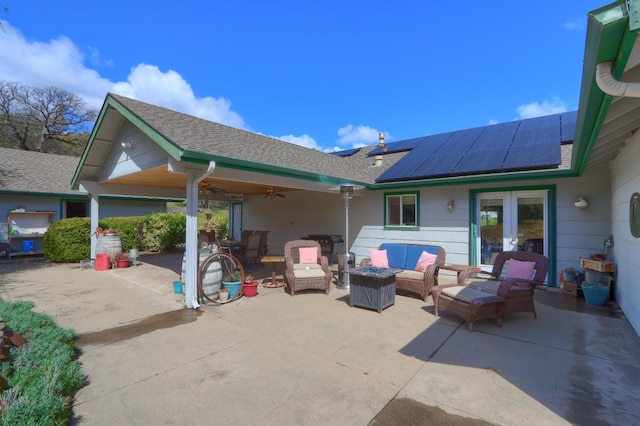 view of patio / terrace with outdoor lounge area, ceiling fan, and french doors