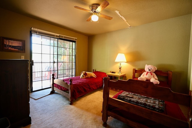 40547 Saddleback Rd, Bass Lake, CA 93604 - carpeted bedroom with a ceiling fan