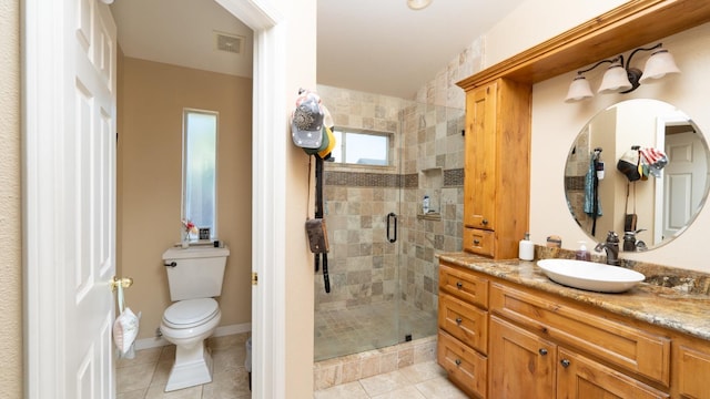 218 Casa Buena Ln, Coalinga, CA 93210 - full bath with vanity, toilet, tile patterned floors, and a stall shower