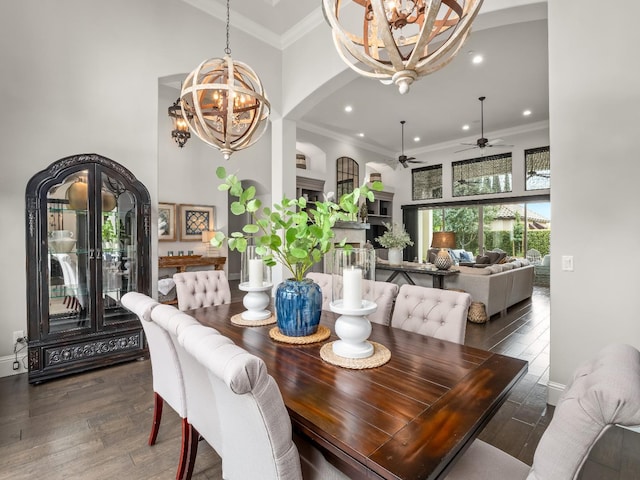 2567 E Sarazen, Fresno, CA 93730 - dining area featuring a chandelier, a ceiling fan, a towering ceiling, crown molding, and recessed lighting