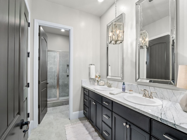 2567 E Sarazen, Fresno, CA 93730 - bathroom featuring double vanity and a stall shower