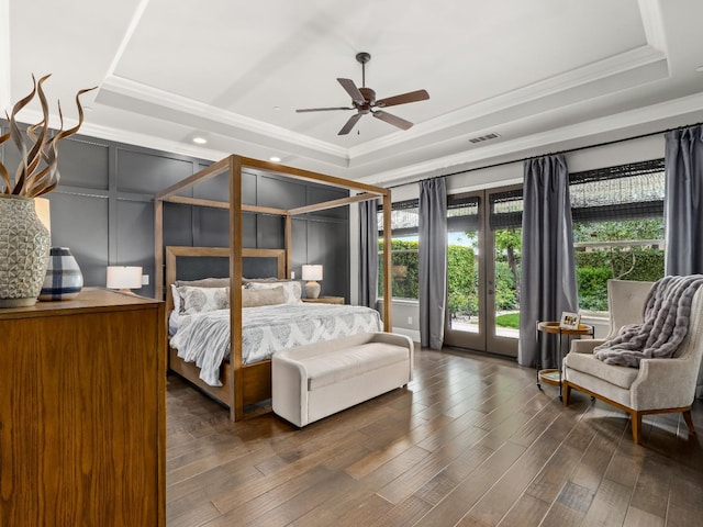 2567 E Sarazen, Fresno, CA 93730 - bedroom featuring a raised ceiling, french doors, ornamental molding, a decorative wall, and access to exterior