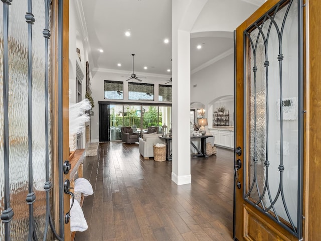 2567 E Sarazen, Fresno, CA 93730 - entryway with ceiling fan, arched walkways, crown molding, hardwood / wood-style floors, and recessed lighting