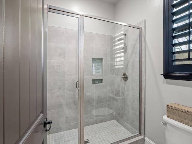 2567 E Sarazen, Fresno, CA 93730 - bathroom featuring toilet and a stall shower