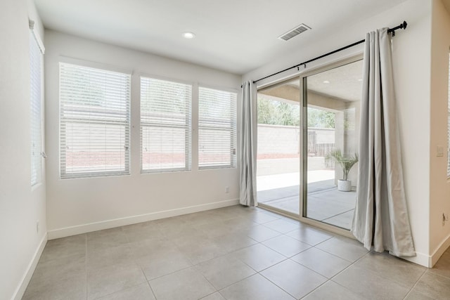 377 Wishon Way W, Madera, CA 93636 - empty room with light tile patterned floors and recessed lighting