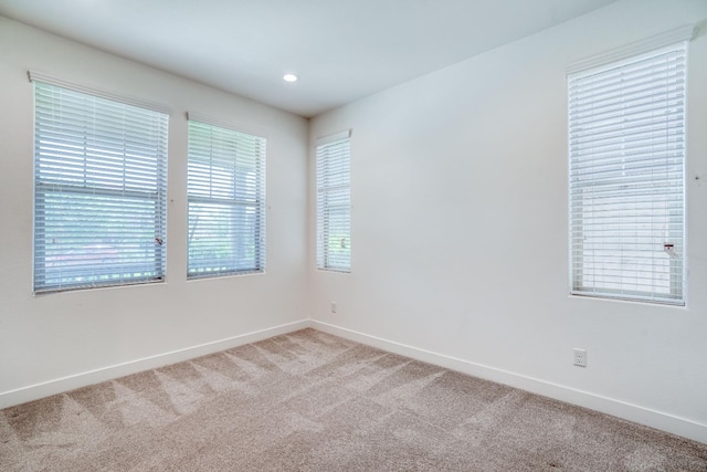 377 Wishon Way W, Madera, CA 93636 - unfurnished room featuring light carpet and recessed lighting