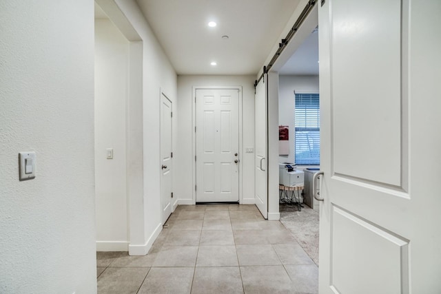 377 Wishon Way W, Madera, CA 93636 - hall with a barn door, light tile patterned flooring, and recessed lighting
