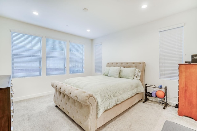 377 Wishon Way W, Madera, CA 93636 - bedroom with light colored carpet, multiple windows, and recessed lighting