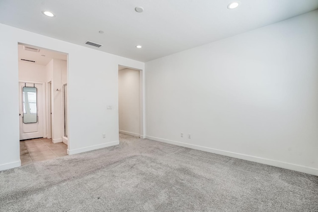 377 Wishon Way W, Madera, CA 93636 - unfurnished bedroom featuring light colored carpet and recessed lighting