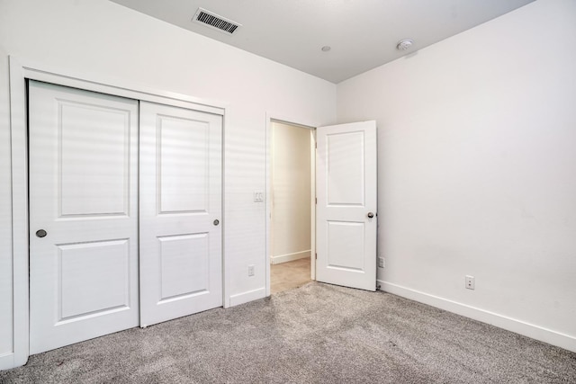 377 Wishon Way W, Madera, CA 93636 - unfurnished bedroom featuring carpet floors and a closet