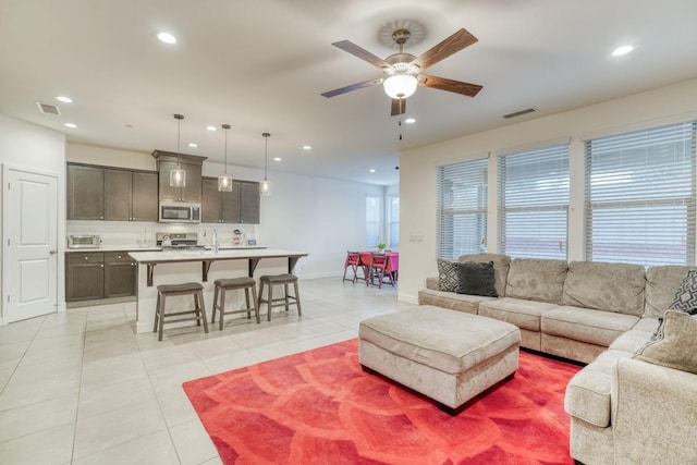 377 Wishon Way W, Madera, CA 93636 - living area with recessed lighting, light tile patterned flooring, and ceiling fan