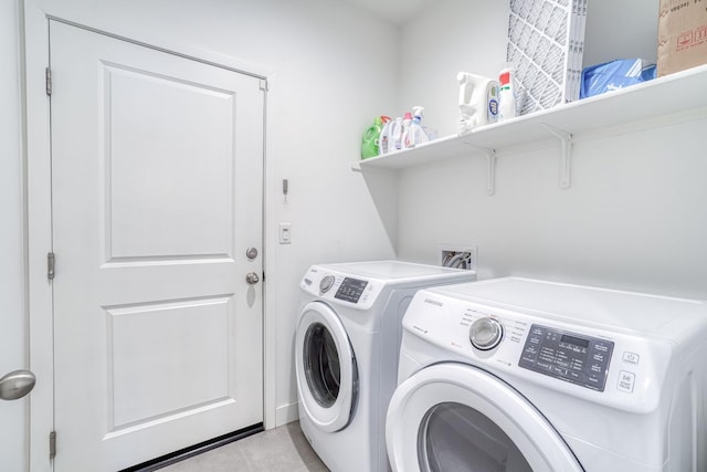 377 Wishon Way W, Madera, CA 93636 - laundry area with washer and dryer and light tile patterned flooring