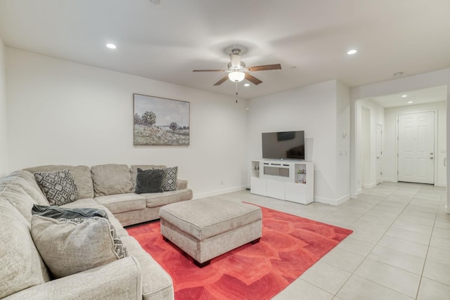 living room with recessed lighting, a ceiling fan, light tile patterned floors, and baseboards