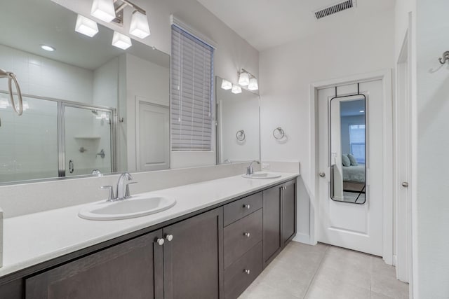377 Wishon Way W, Madera, CA 93636 - ensuite bathroom featuring tile patterned flooring, double vanity, and an enclosed shower