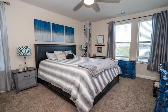 carpeted bedroom featuring visible vents, ceiling fan, and baseboards