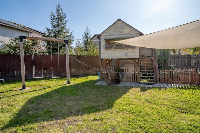 view of yard with a fenced backyard