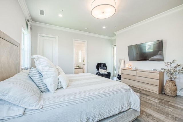 bedroom with recessed lighting, light wood-style floors, visible vents, and ornamental molding