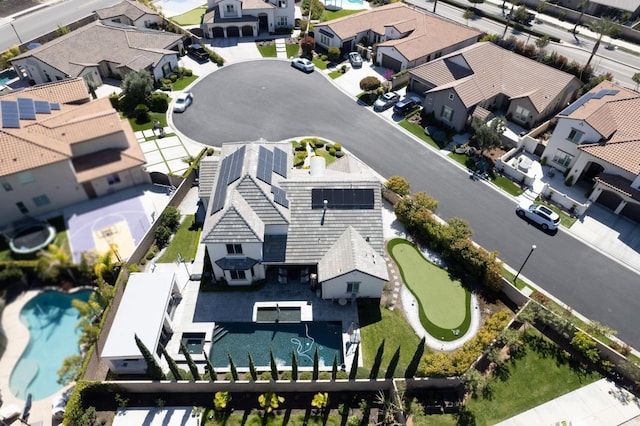 birds eye view of property with a residential view