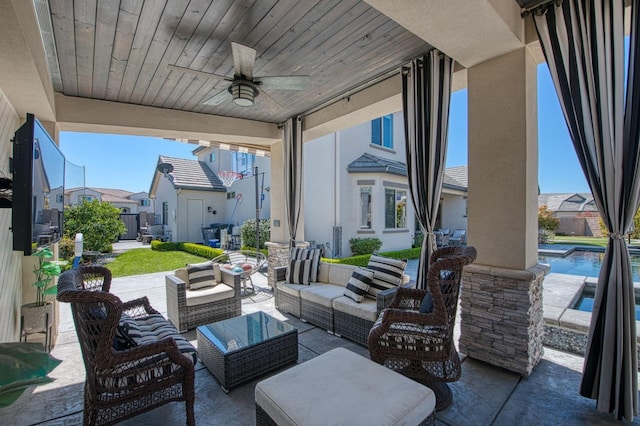 view of patio featuring a ceiling fan, a fenced in pool, a residential view, and an outdoor hangout area