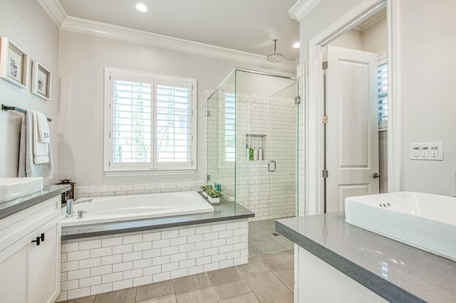 bathroom with a bath, ornamental molding, recessed lighting, vanity, and a stall shower