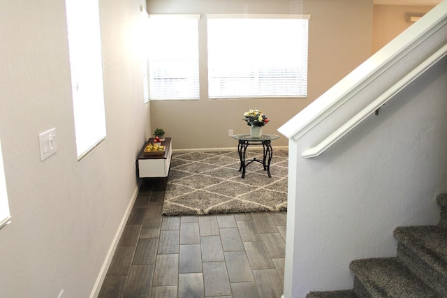 2060 N Walker Ln, Clovis, CA 93619 - corridor featuring stairway, baseboards, and wood finish floors