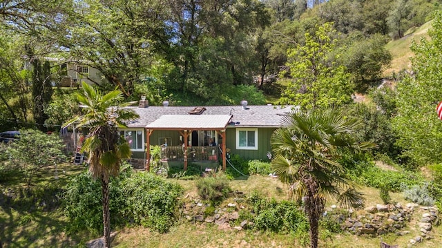 ranch-style home featuring covered porch
