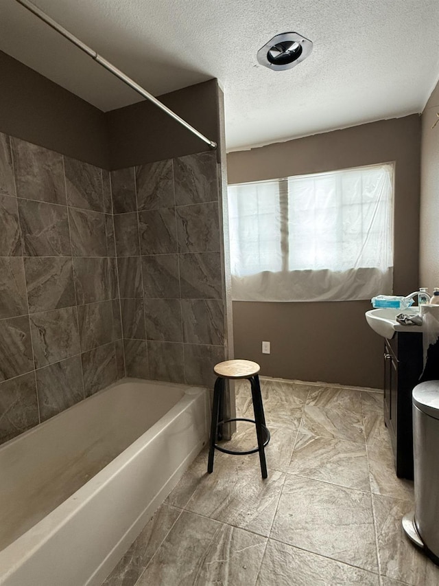 342 N Minnewawa, Fresno, CA 93727 - full bath featuring vanity,  shower combination, and a textured ceiling