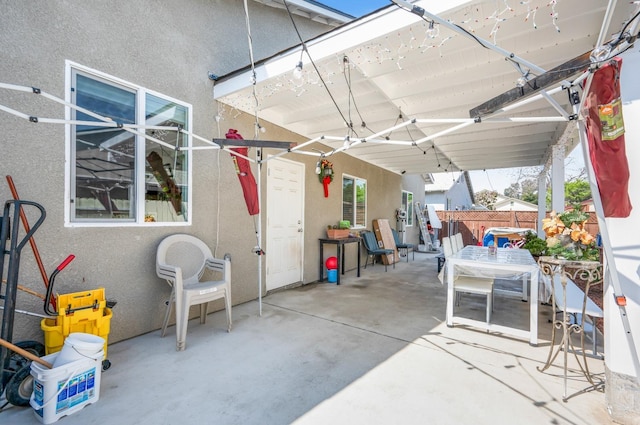 375 Amber Ln, Dinuba, CA 93618 - view of patio / terrace with outdoor dining space and fence