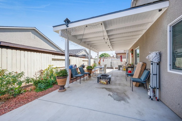 375 Amber Ln, Dinuba, CA 93618 - view of patio / terrace with a fenced backyard and an outdoor fire pit