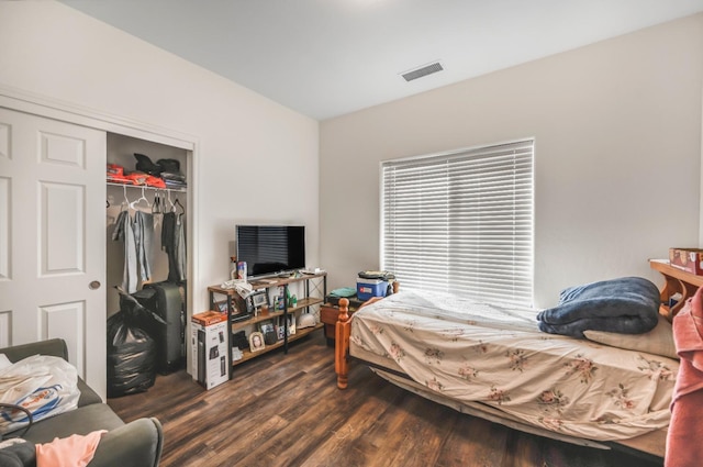 375 Amber Ln, Dinuba, CA 93618 - bedroom with a closet, dark wood-style flooring, and visible vents