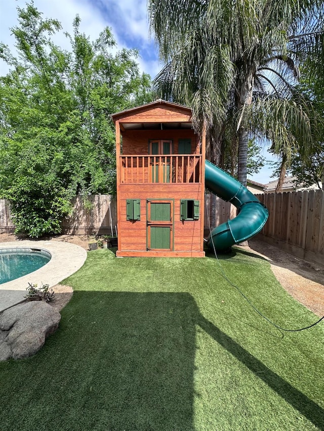 8352 N Shallot Way, Fresno, CA 93720 - view of playground with a fenced backyard and a yard