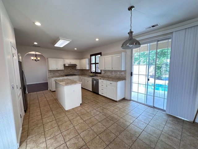 8352 N Shallot Way, Fresno, CA 93720 - kitchen featuring tasteful backsplash, a sink, appliances with stainless steel finishes, under cabinet range hood, and visible vents
