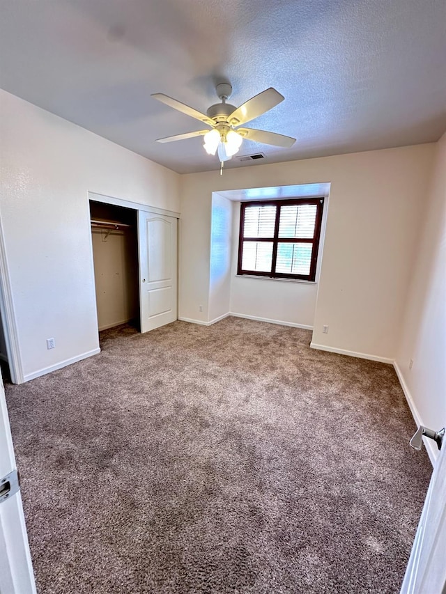8352 N Shallot Way, Fresno, CA 93720 - unfurnished bedroom featuring a closet, ceiling fan, carpet floors, baseboards, and visible vents