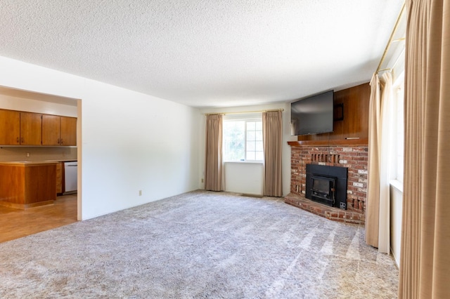 474 Dartmouth Ave, Coalinga, CA 93210 - unfurnished living room with light colored carpet and a textured ceiling
