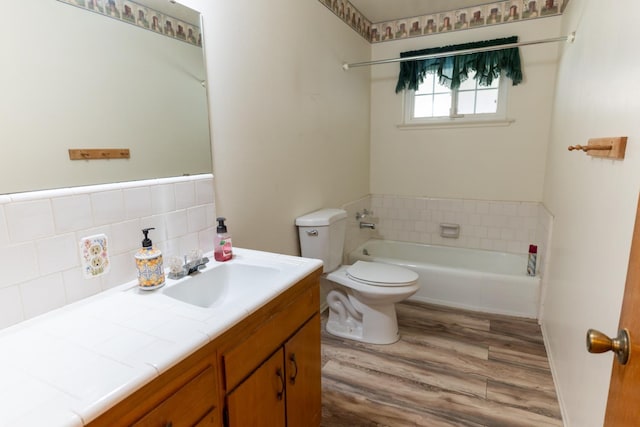 474 Dartmouth Ave, Coalinga, CA 93210 - full bathroom with a garden tub, vanity, toilet, and wood finished floors