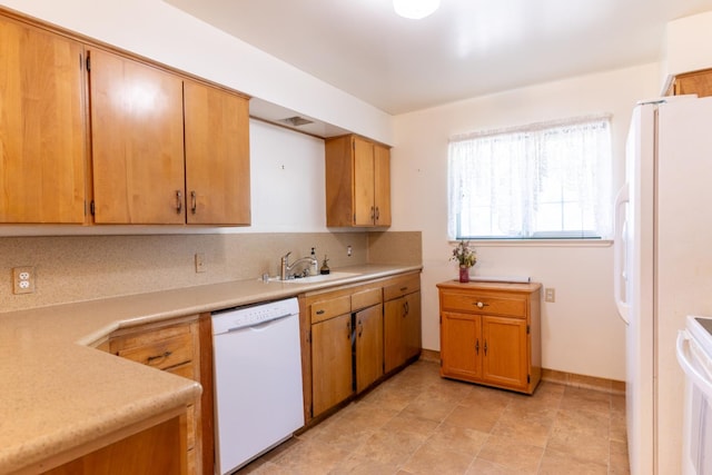 474 Dartmouth Ave, Coalinga, CA 93210 - kitchen featuring white appliances, a sink, backsplash, and light countertops