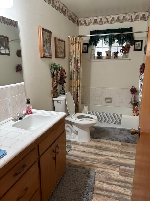 474 Dartmouth Ave, Coalinga, CA 93210 - full bath featuring toilet, a bathing tub, wood finished floors, a shower with shower curtain, and vanity