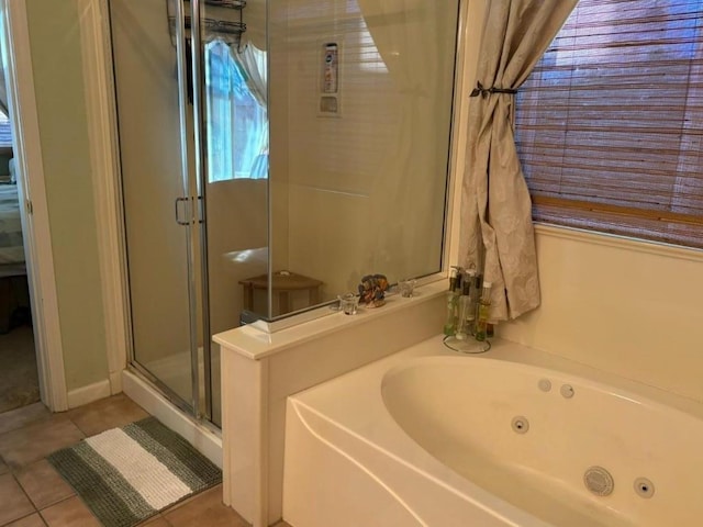 1068 San Ramon Ave, Madera, CA 93637 - full bath featuring a shower stall, tile patterned floors, and a whirlpool tub