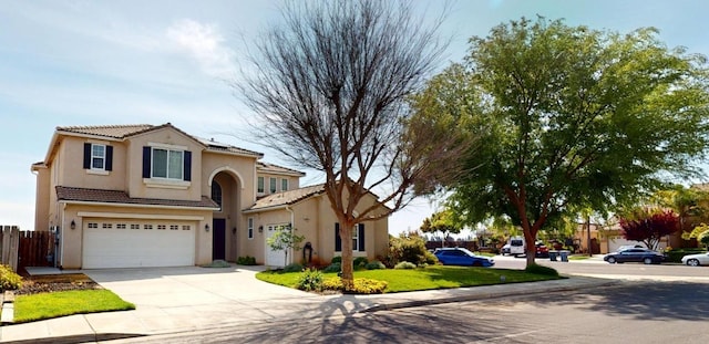 1051 N Coventry Ave, Clovis, CA 93611 - view of front of property featuring a garage, fence, a tile roof, and driveway
