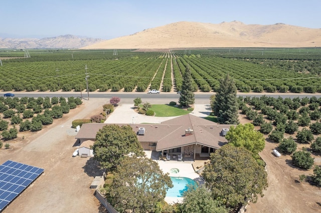 bird's eye view featuring a mountain view and a rural view