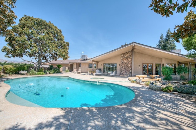 pool featuring a patio