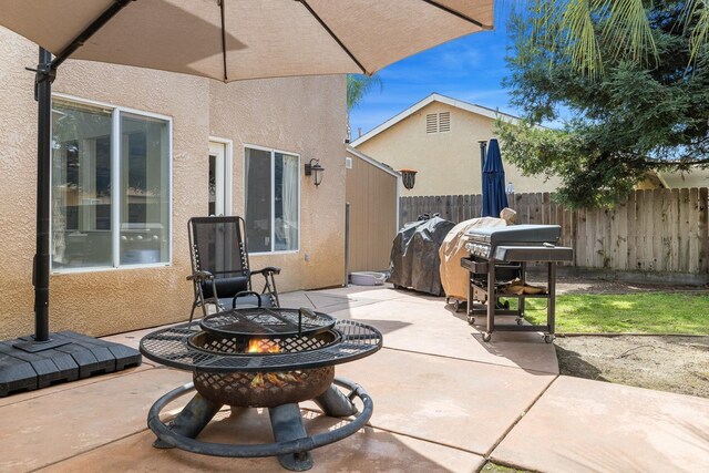 3232 Greenfield Ave, Clovis, CA 93611 - view of patio / terrace with a fire pit and area for grilling