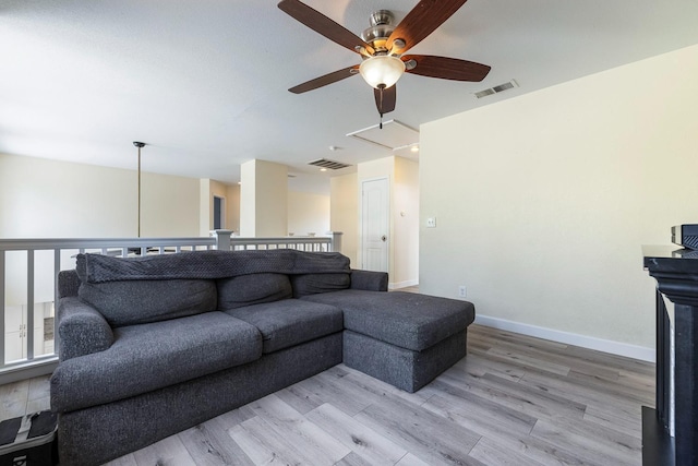 3232 Greenfield Ave, Clovis, CA 93611 - living room with a ceiling fan, attic access, and light wood-type flooring